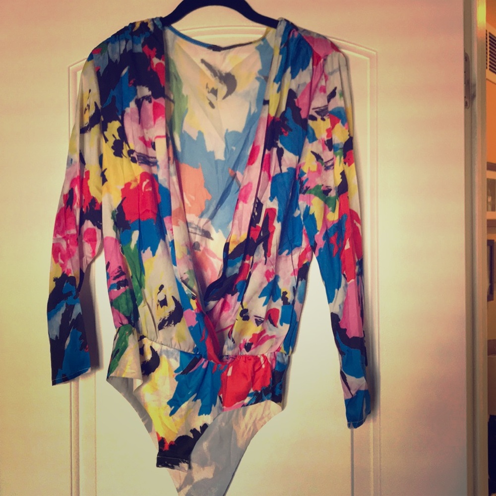 Bright, light fabric long sleeve body suit